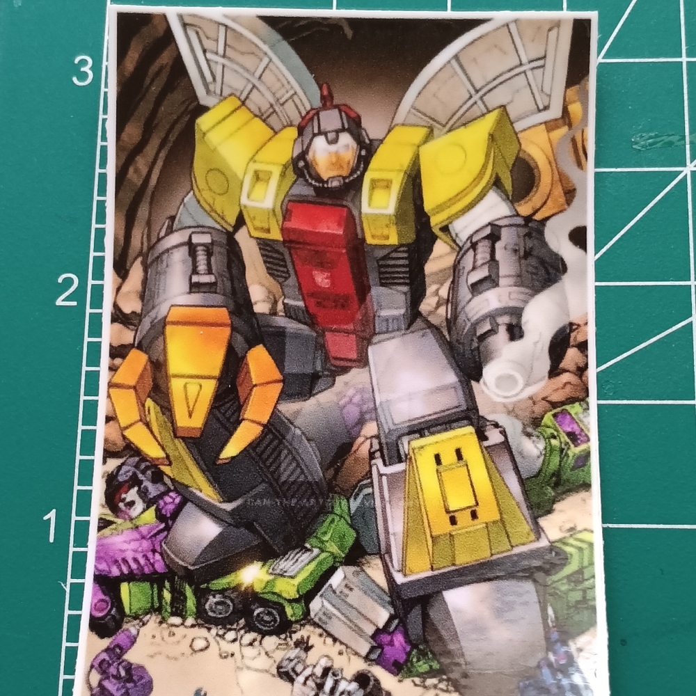 TRANSFORMERS OMEGA SUPREME VS DEVESTATOR STICKER